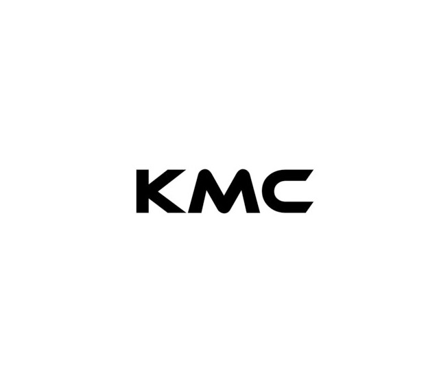 K M C